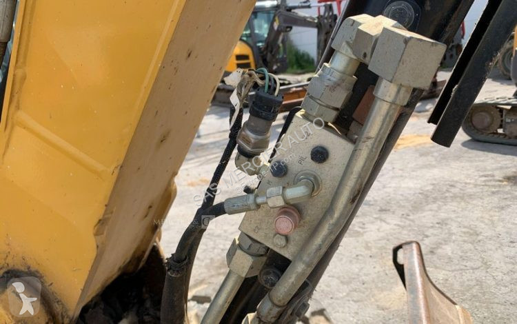 Skovl Caterpillar minipelle sur chenilles diesel
