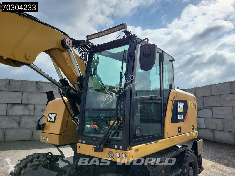 جرافة Caterpillar F F Outrigger + Blade