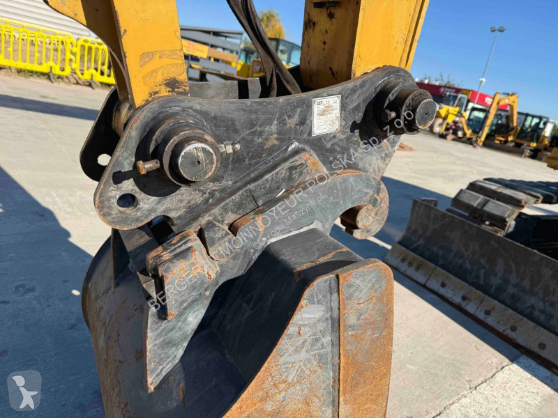Экскаватор Caterpillar 310
