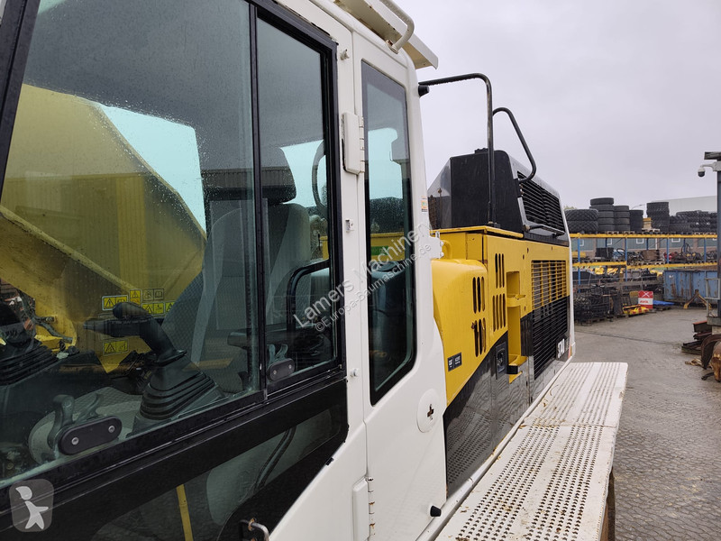 Багер Caterpillar 374F D .