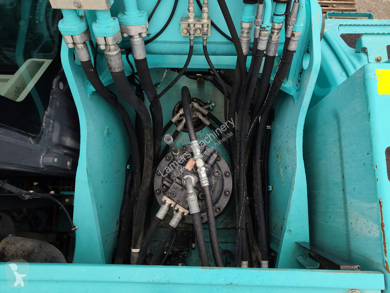 جرافة Kobelco SK350 NLC-9 .