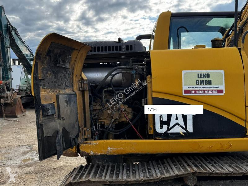 Escavatore Caterpillar C Mit Zwei Löffeln