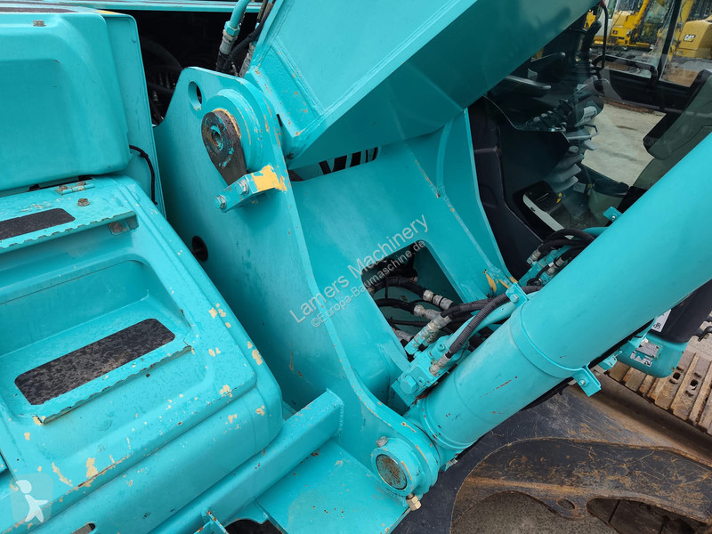 جرافة Kobelco SK350 NLC-9 .