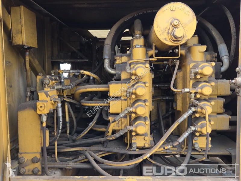 Багер Caterpillar 215C