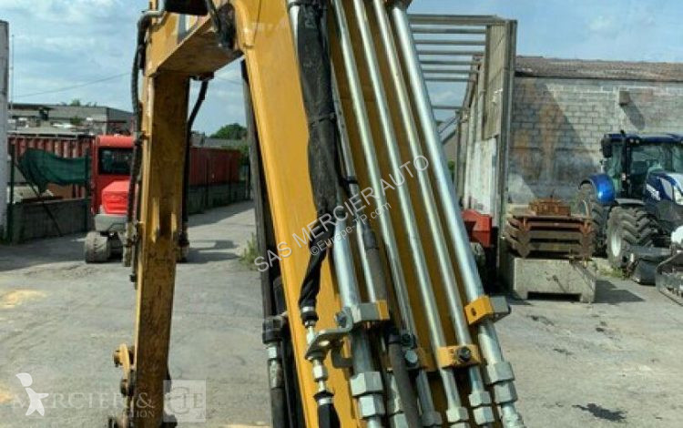 Skovl Caterpillar minipelle sur chenilles diesel
