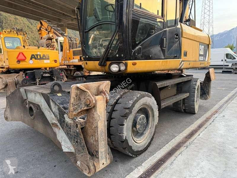 Skovel Caterpillar DMH