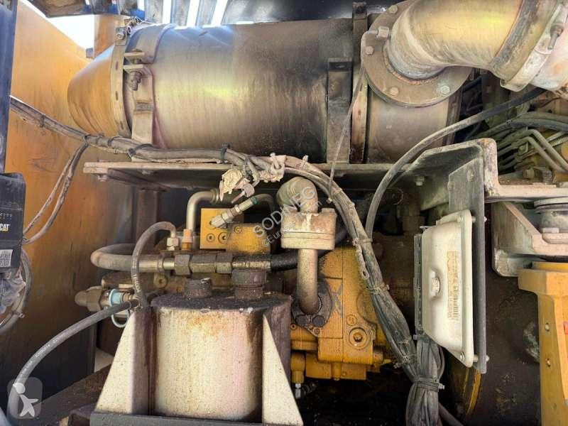 Багер Caterpillar MH