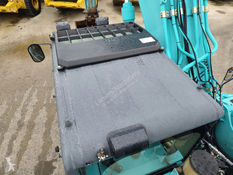 جرافة Kobelco SK350 NLC-9 .