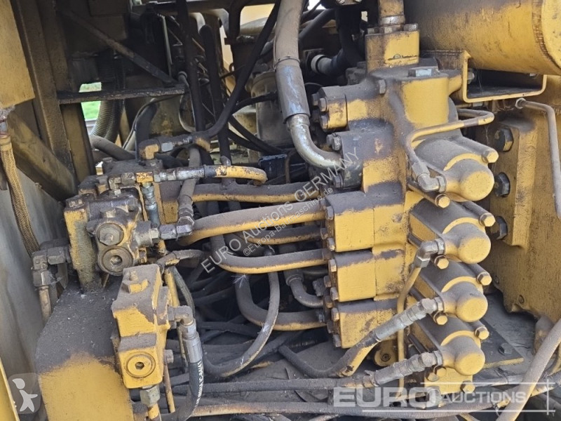 Багер Caterpillar 215C