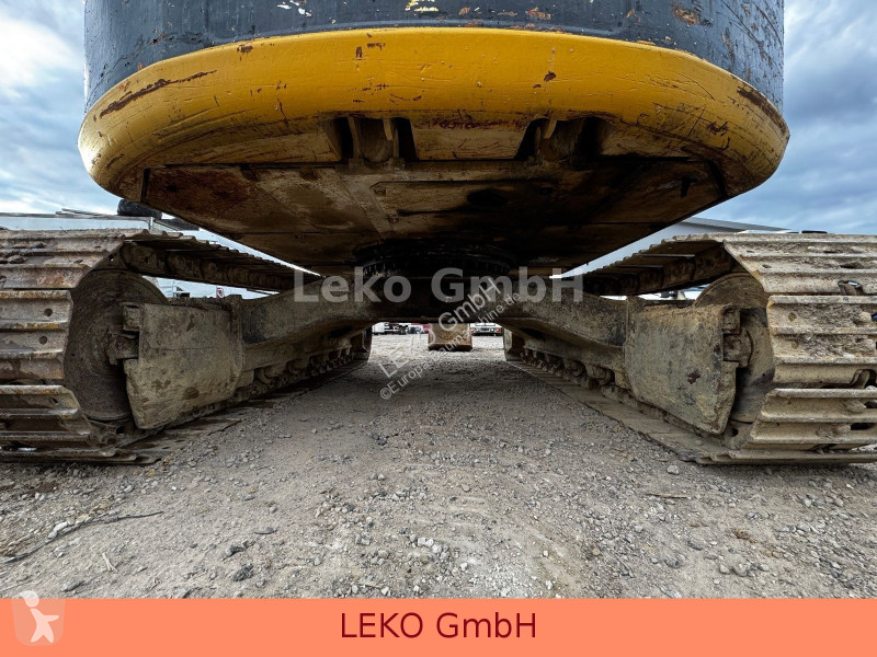 Rýpadlo Caterpillar 311C Mit Zwei Löffeln