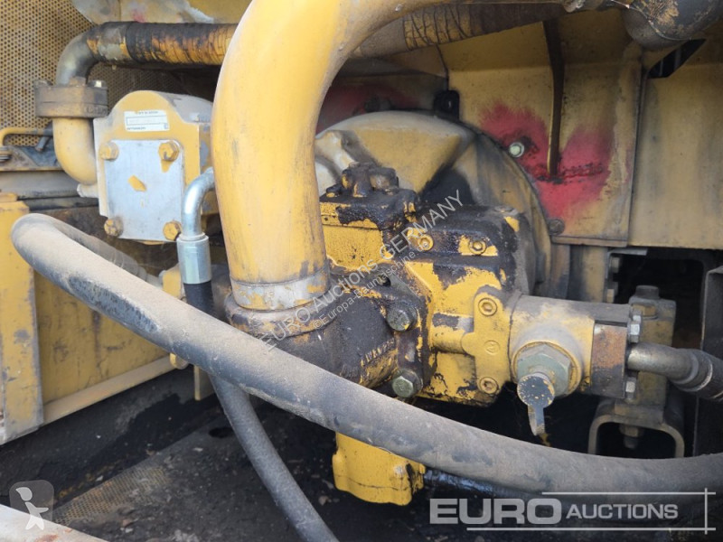 Багер Caterpillar 215C