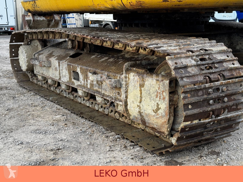 Rýpadlo Caterpillar 311C Mit Zwei Löffeln