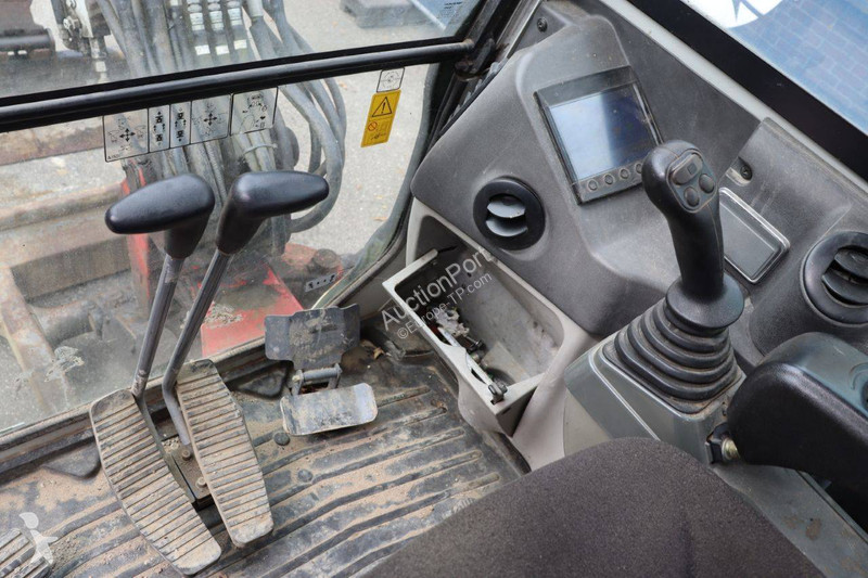 جرافة Takeuchi 0
