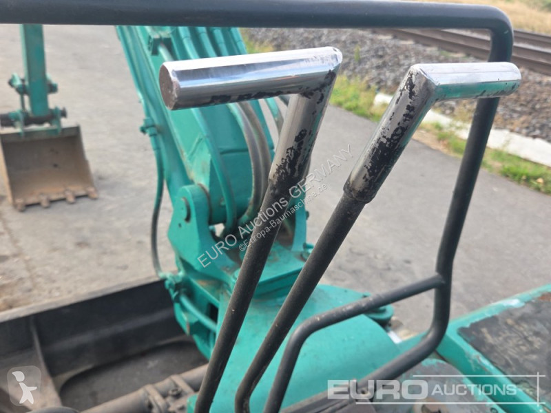 Багер Komatsu PC25-1