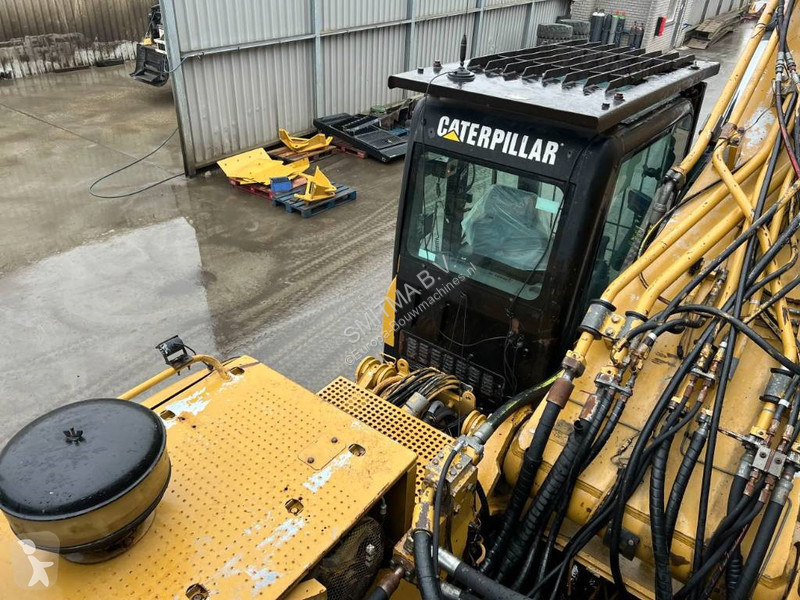 جرافة Caterpillar L UHD - 27m - OilQuick