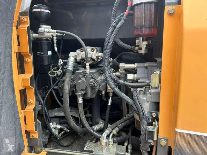 Escavadora Case