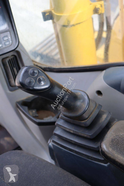 Багер New Holland Kobelco 2