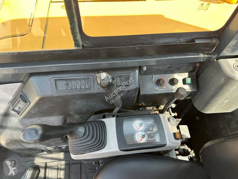 Екскаватор Komatsu 7
