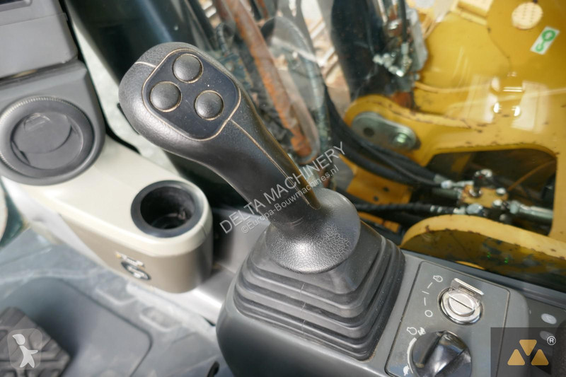 Багер Caterpillar LME