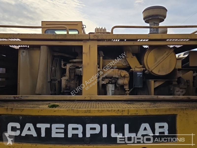 Багер Caterpillar 215C