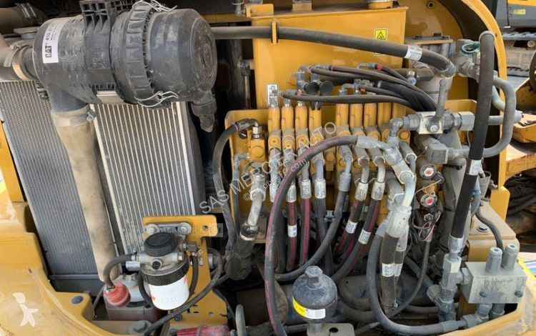 Skovl Caterpillar minipelle sur chenilles diesel