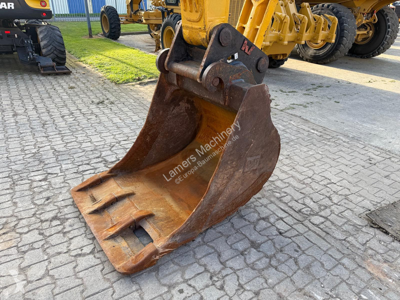 Багер Komatsu PC 210-11 .