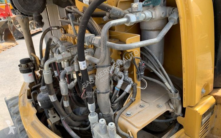 Skovl Caterpillar minipelle sur chenilles diesel