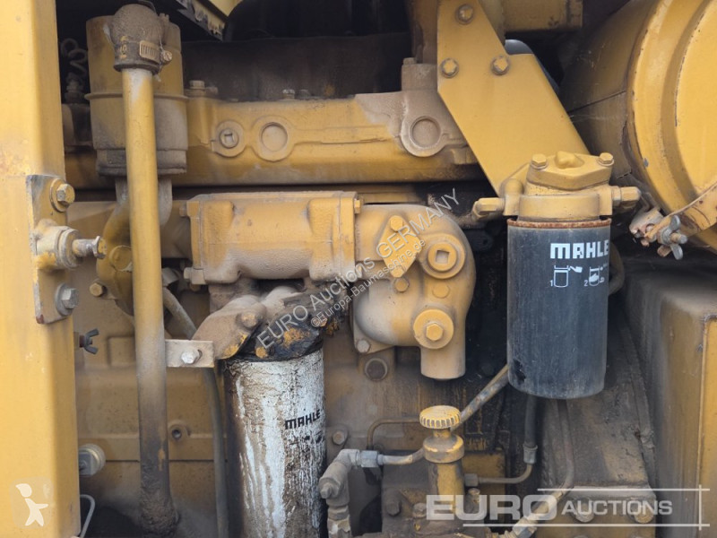 Багер Caterpillar 215C