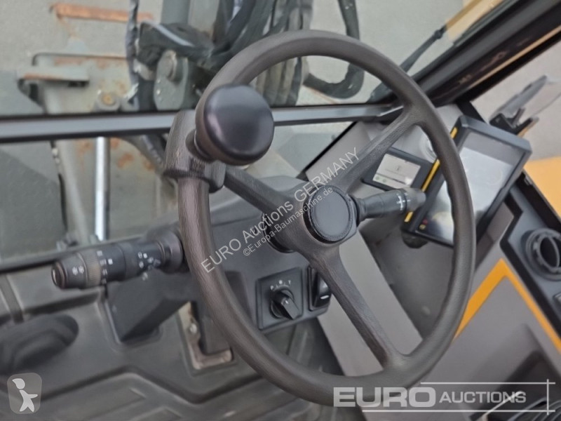Багер Volvo EW60E