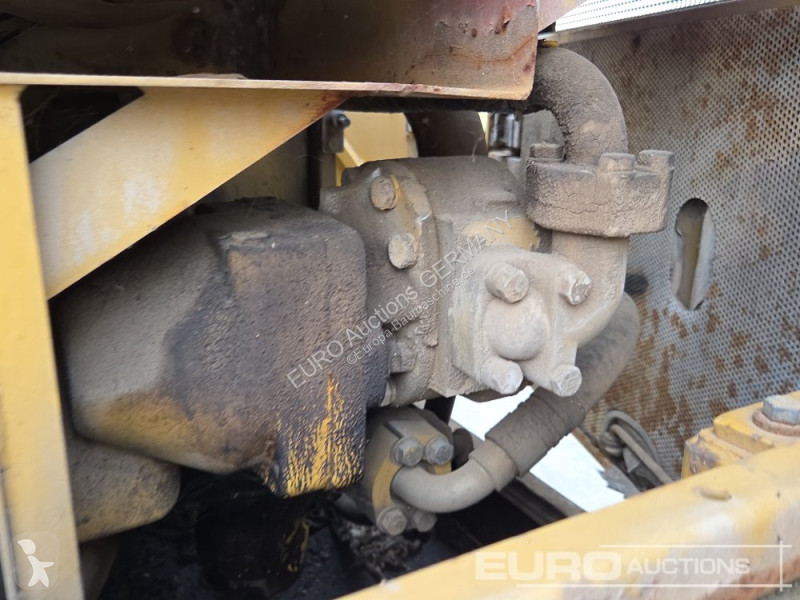 Багер Caterpillar 215C