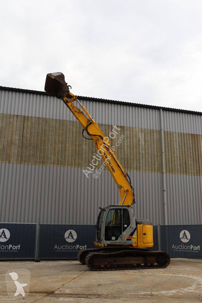 Багер New Holland Kobelco 2
