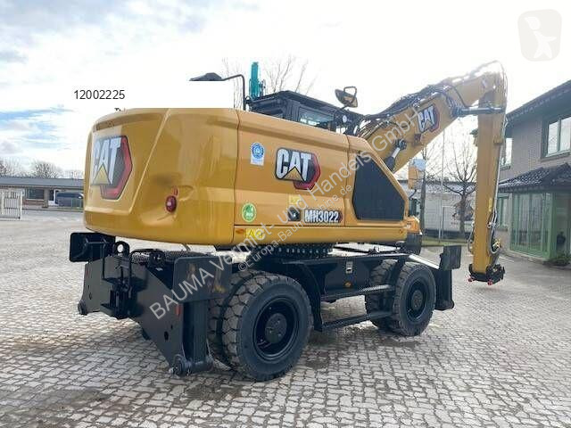 Graafmachine Caterpillar MH 3022 MIETE / RENTAL...