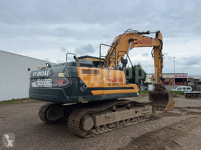 Escavatore Hyundai HX300 NL with a bucket and...