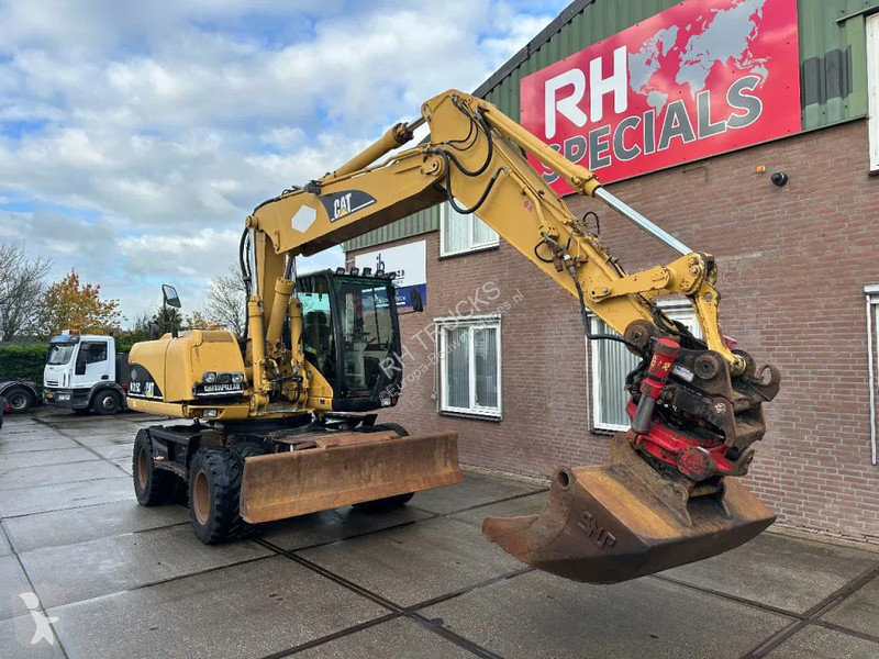 Excavator Caterpillar C WITH ROTOTILT, CE