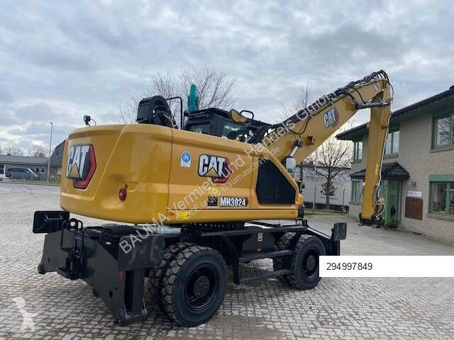 Skovel Caterpillar MH 3024 MIETE / RENTAL...