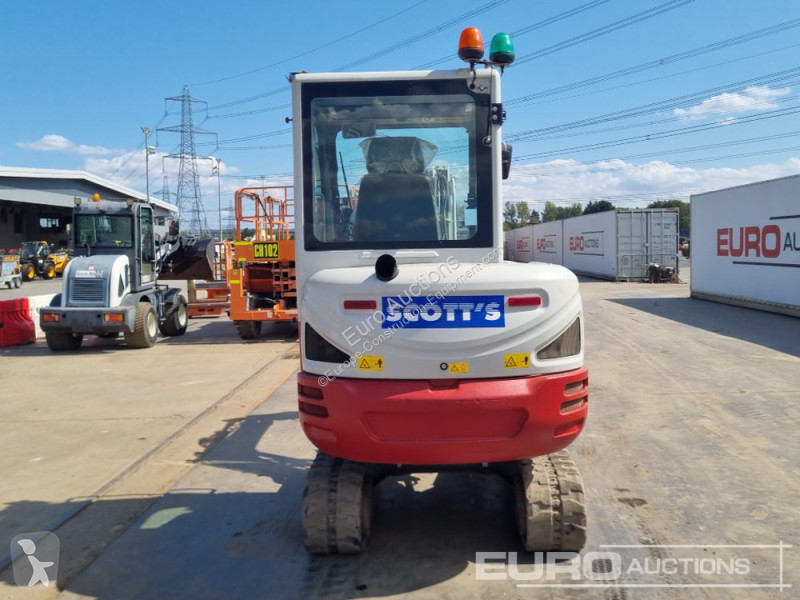 Escavadora Takeuchi 0