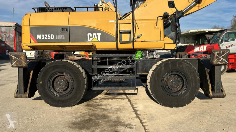 Rýpadlo Caterpillar M 4X4