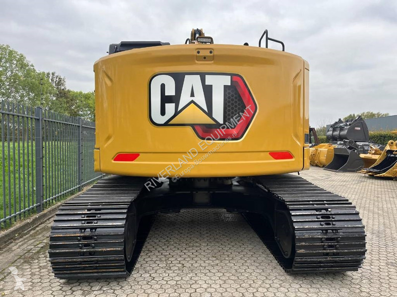 Rýpadlo Caterpillar 325 with dozerblade 1085...