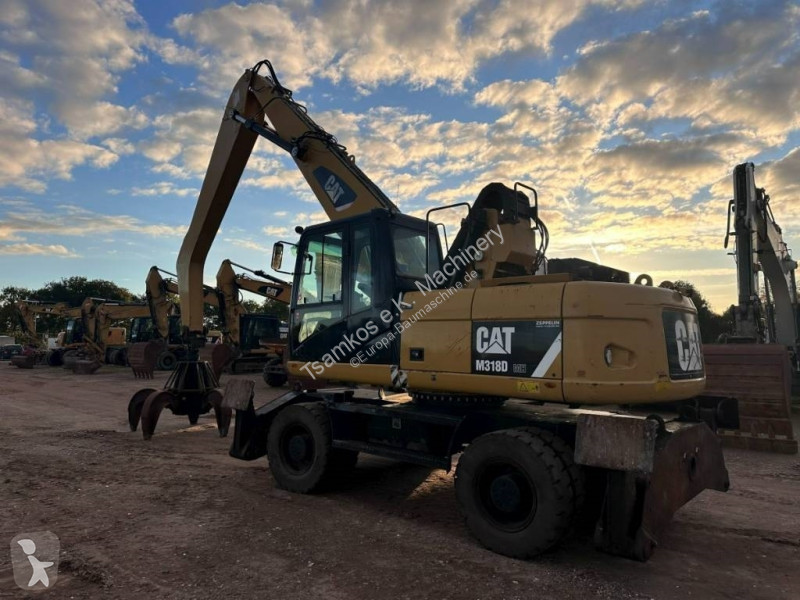 Lopatový nakládač Caterpillar M 318 MH mit...