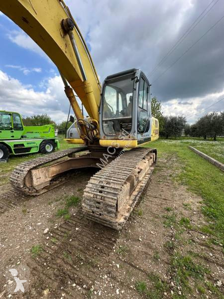 Rýpadlo New Holland 305