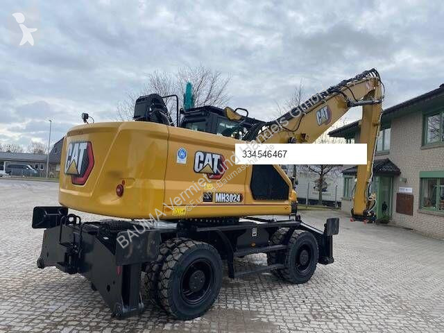 جرافة Caterpillar MH 3024 MIETE / RENTAL...