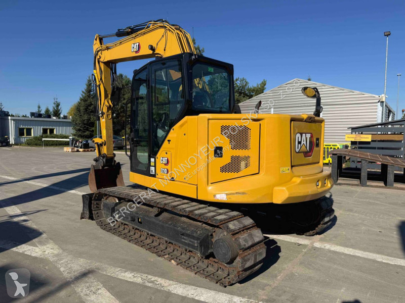 Экскаватор Caterpillar 310