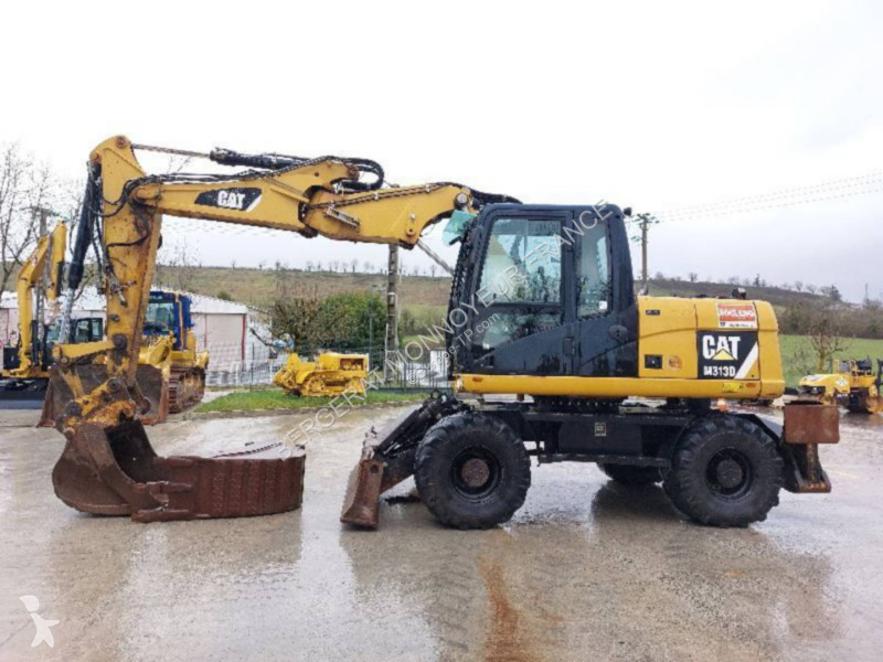 جرافة Caterpillar M313D