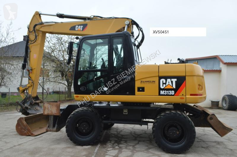 Lopatový nakládač Caterpillar 313