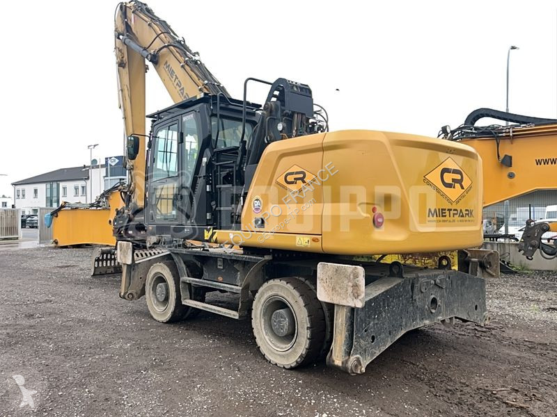Rýpadlo Caterpillar MH3026