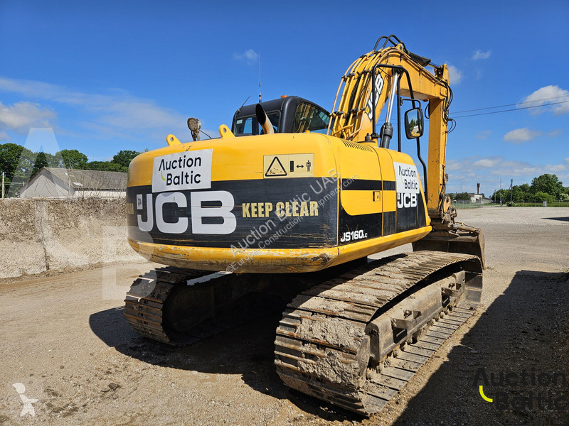 Lopatový nakládač JCB