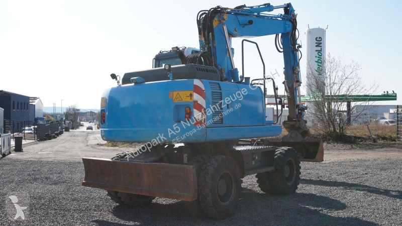 جرافة Komatsu Mobilbagger Verstellausleger HS21