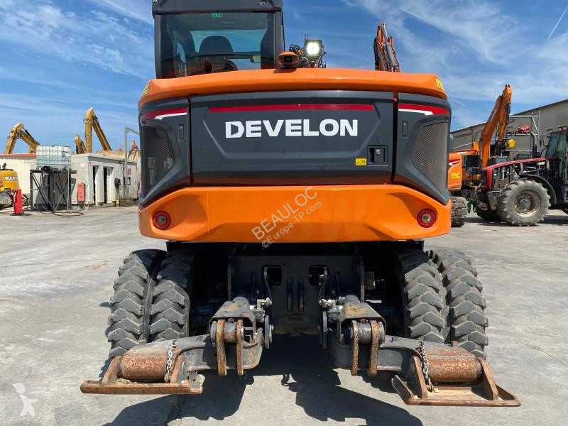 Экскаватор Develon  dx100w