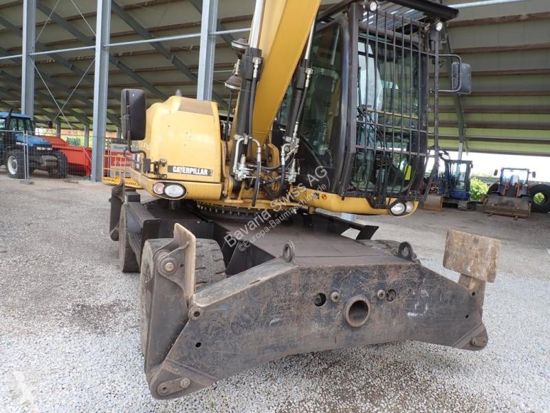 Lopatový nakládač Caterpillar  M318D MH