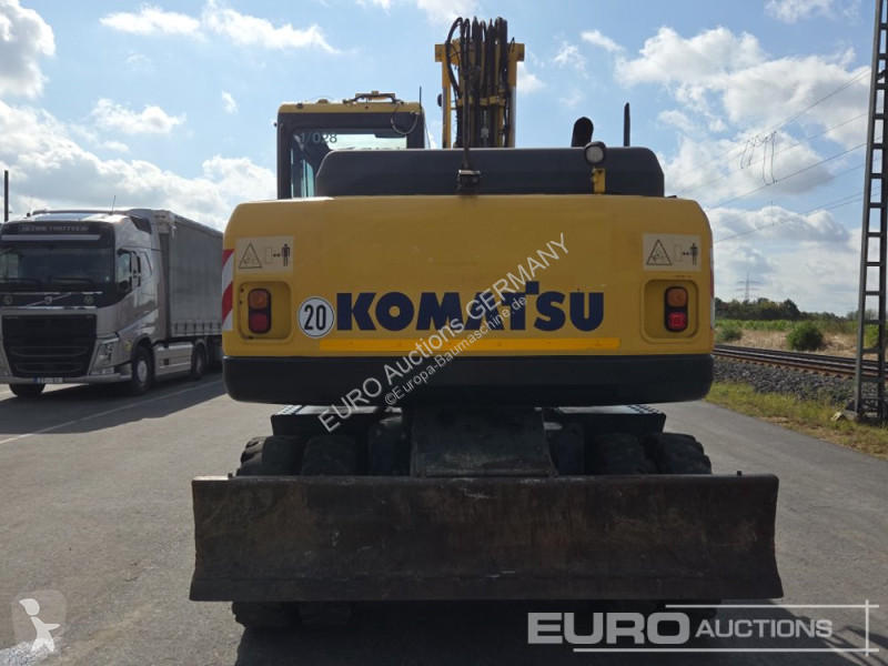 Багер Komatsu